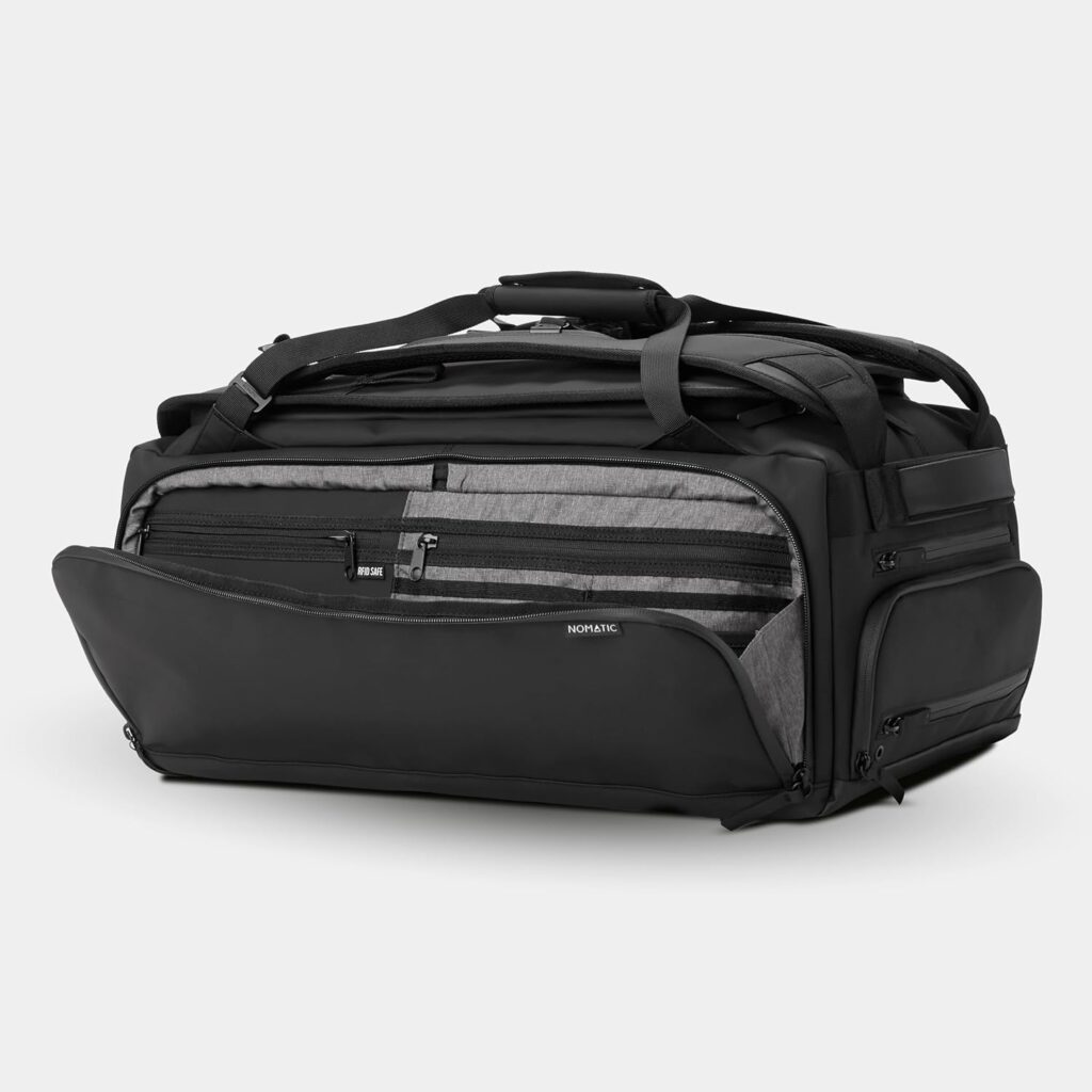 Open Nomatic Travel Pack 40L showing interior compartments and organization features.