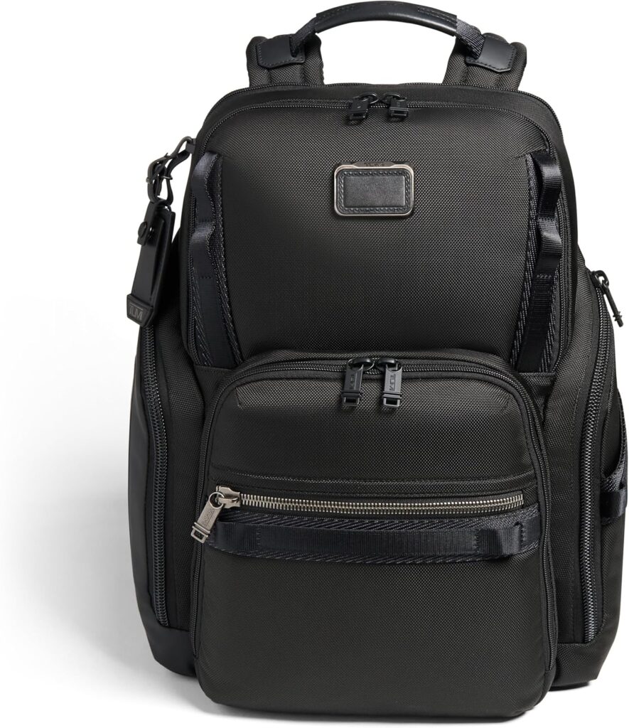 Black TUMI backpack, ideal for travel for business with multiple compartments and sleek design.