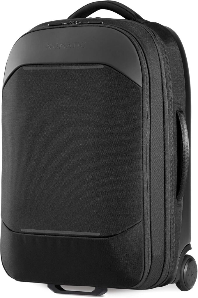 Nomatic Navigator Carry-On Review: Black rolling suitcase with handle and logo.