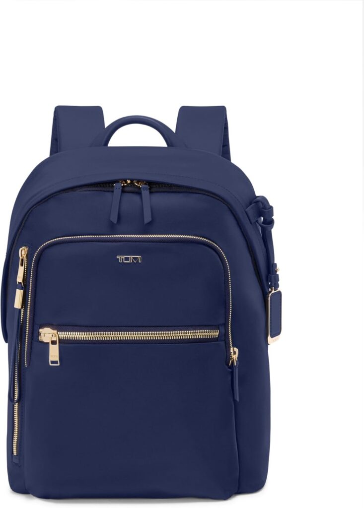 Navy blue Tumi Voyageur backpack with gold zippers. Tumi Voyageur Review.