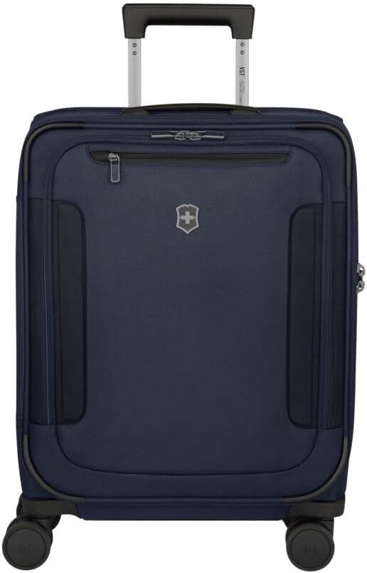 Navy blue Victorinox rolling carry-on suitcase with extended handle, ideal for business class travel.